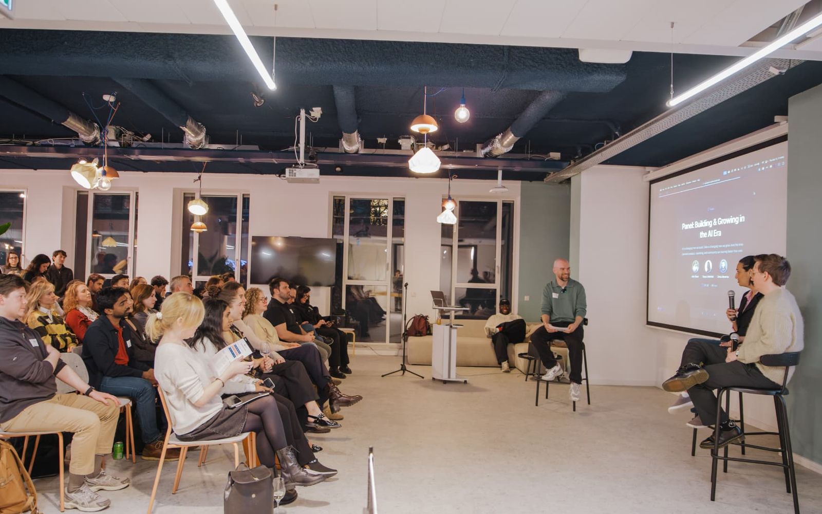 Audience and panel at the Amplitude and Lovable Future of Product Building event in Amsterdam.